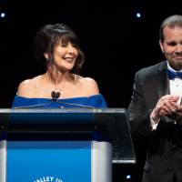 President Philomena Mantella on stage with her husband Bob Avery.